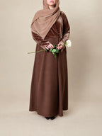 Rivoli, silhouette marron sur fond beige, pack coherent1.